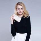 CARTEIRA FEMININA LONGA FOXER FEITA EM CORO REFINADO MODELO MADELEINE